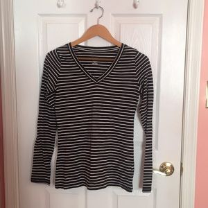 Black and white striped long sleeve v-neck.